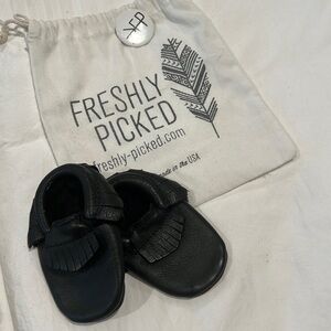 Baby black leather moccasins